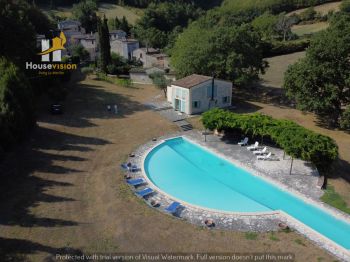 Fine white stone farmhouse with semi-Olympic-size pool and large garden.